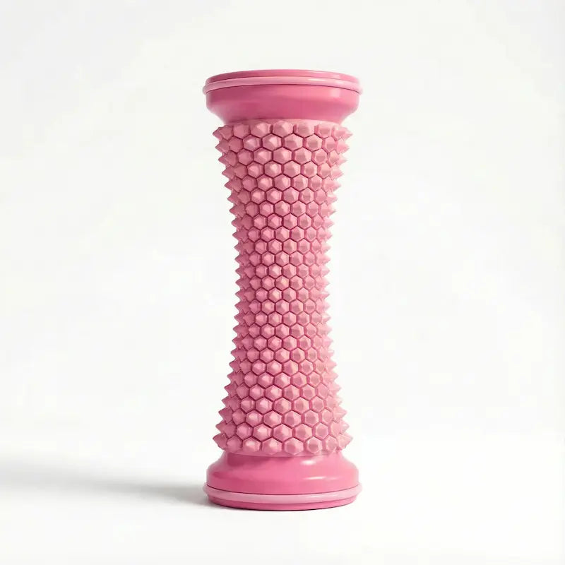 ErgoMassage fasciahjul för fotmassage i rosa med hexagonalt honeycomb-mönster — produktbild stående mot vit bakgrund